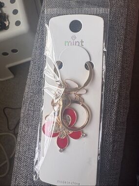 Mint Gold-Tone Keyring with Red Flower Charm and Crystals
